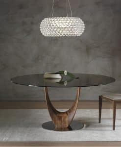 Tavolo da pranzo rotondo con pian in vetro. Tavolo design made in italy. Vendita online di mobili di lusso.