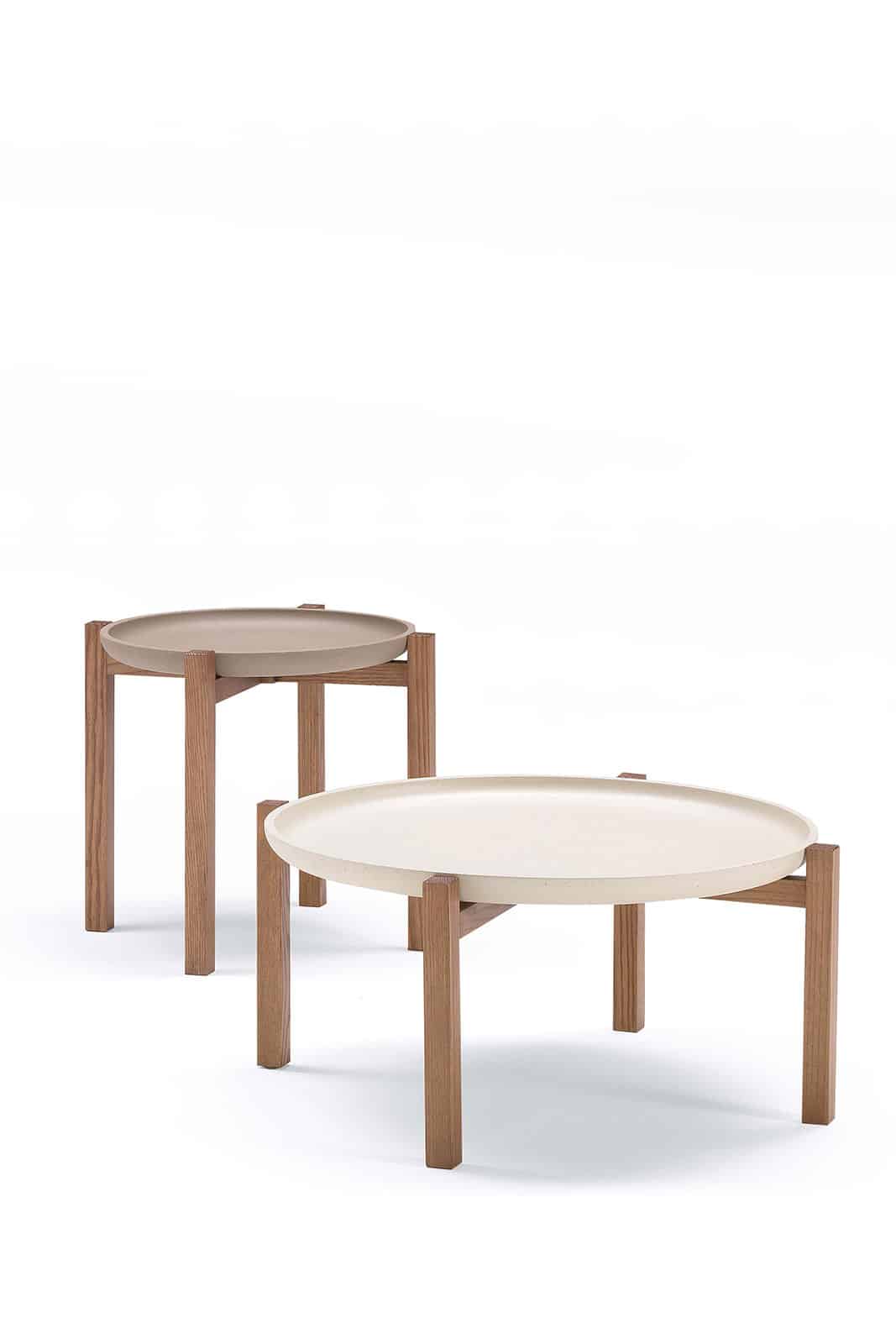 Pong is a coffee table in walnut-stained ash and a cappuccino top, the ideal candidate to become an irreplaceable complement for any home. Shop Online.