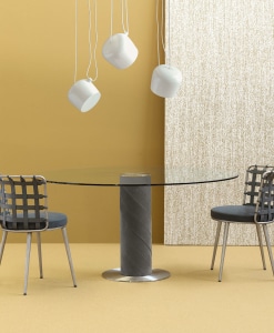 Tavolo rotondo con base in pelle e acciaio. Design G. Vegni. Made in Italy. Consegna gratis a domicilio.