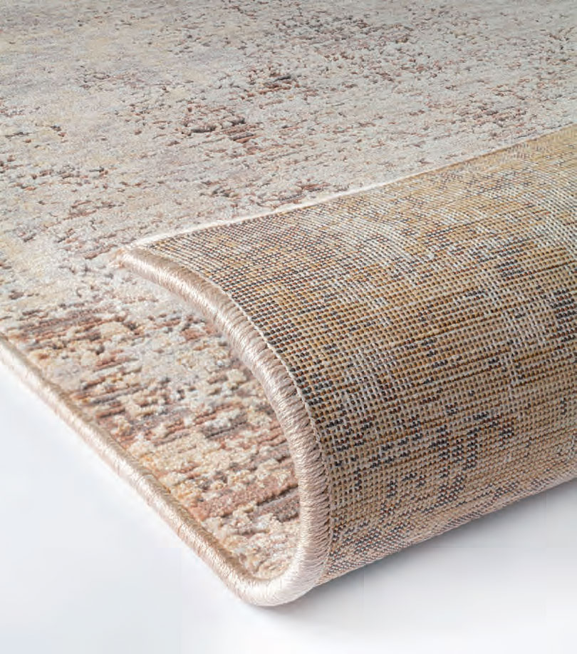 Gros plan sur le velours du tapis Elixir 50/RD9 J Beige Sable