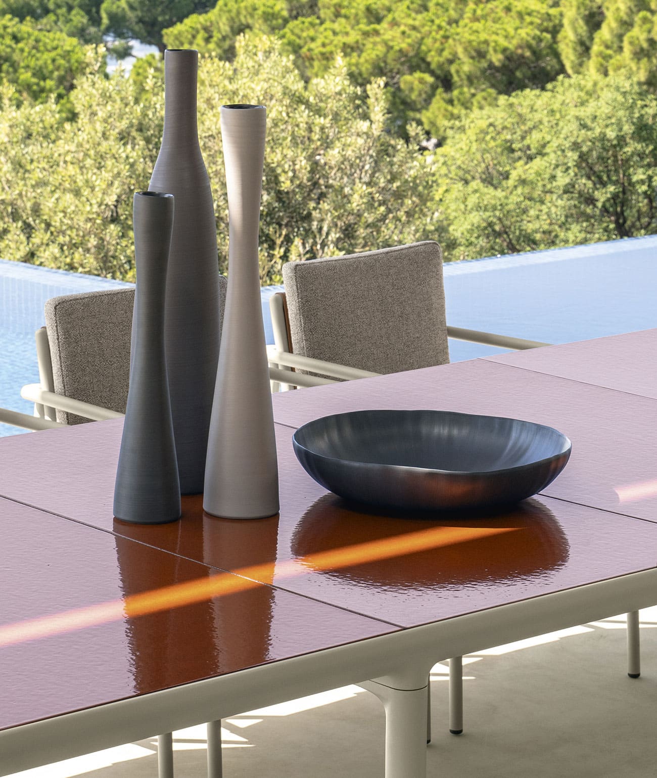 Trex outdoor table with coral lava stone top 340 x 120 cm