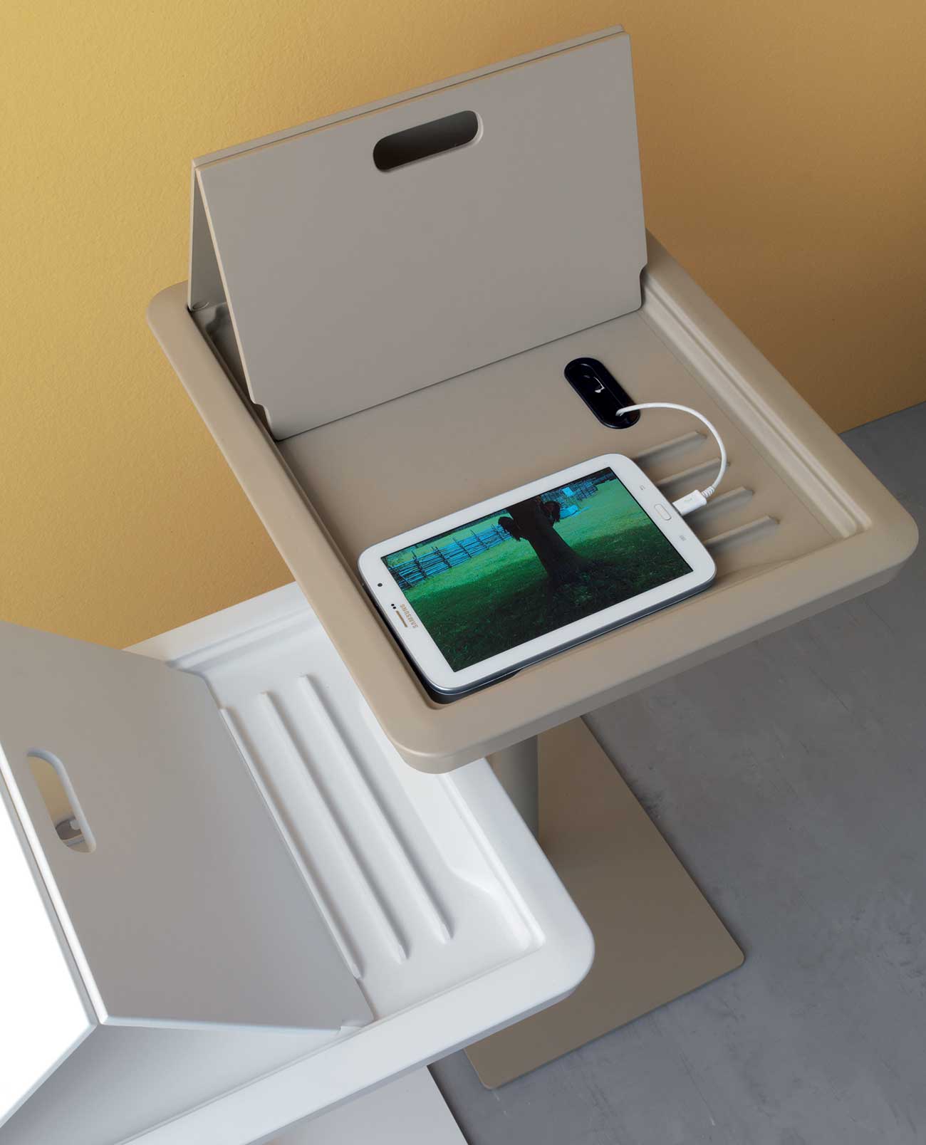 Adjustable tablet holder with opening compartment